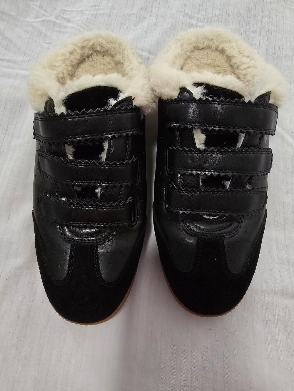 Steve Madden Black Slip-On Sneakers with Cream Faux Fur Lining